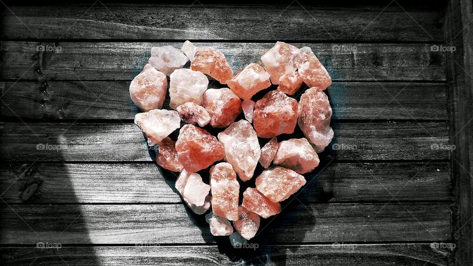 Heart shape stone on table