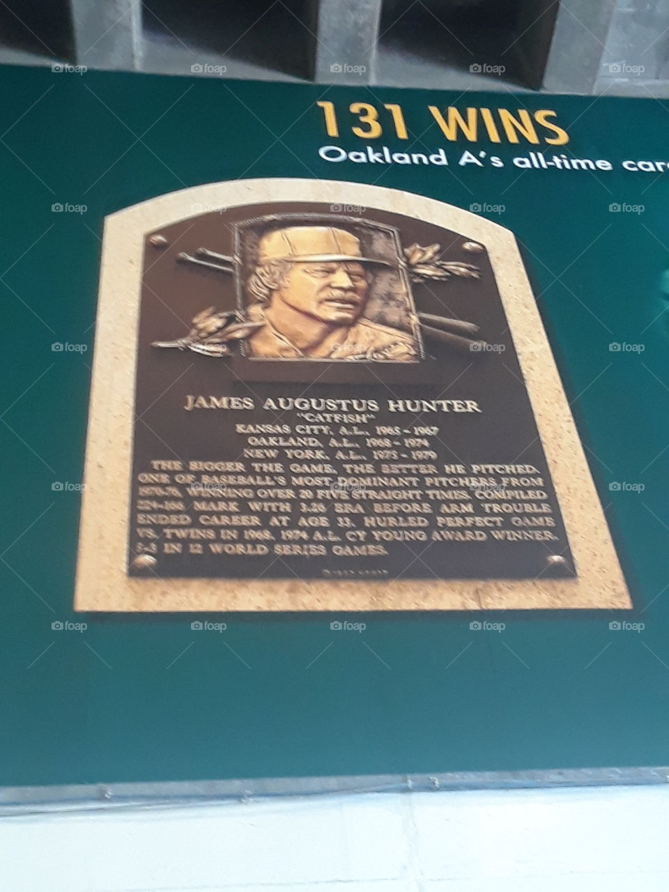 catfish hunter. one of the best Oakland A's all time.He throw the ball with passion and dedication for the Oakland A's ball club.Terrific memory at the ball park.i had to take a picture of this.131 wins for the yellow and green team.