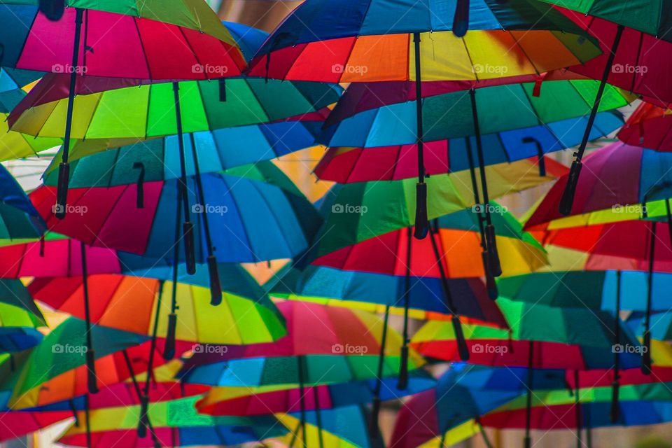 A bunch of colorful umbrellas