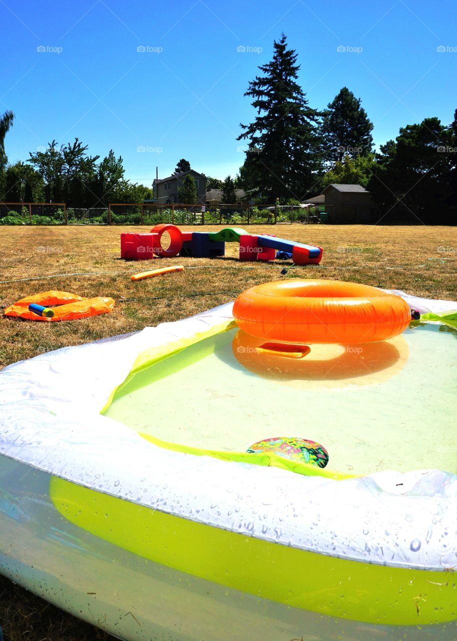 Water Fun. Finding ways to beat the heat at MOM'S group this morning!