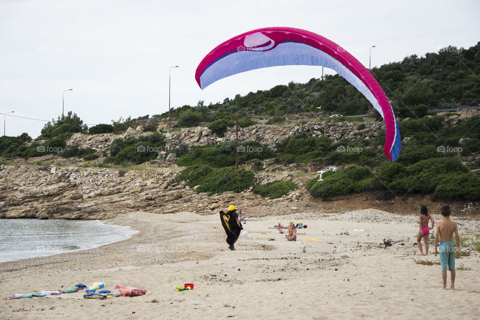 Parachutist landing. parachutist landing on Beba beach,Thassos island in Greece