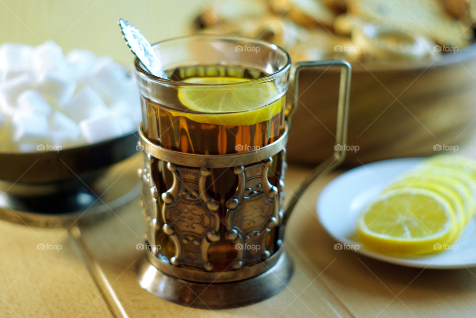 Tea in an old cup holder