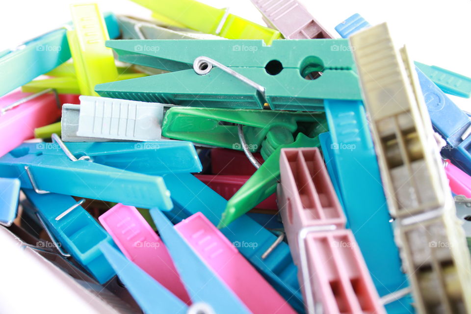 pile of plastic clothes clips