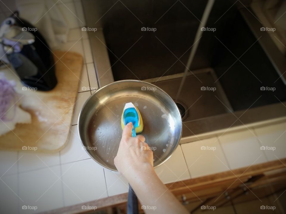 Handy Woman Washing Dishes
