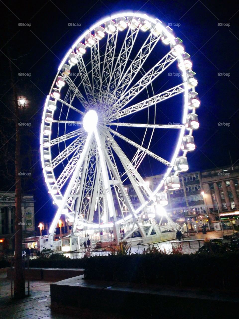 Ferris wheel nottingham. This is a Ferris wheel in Nottingham market square at night time