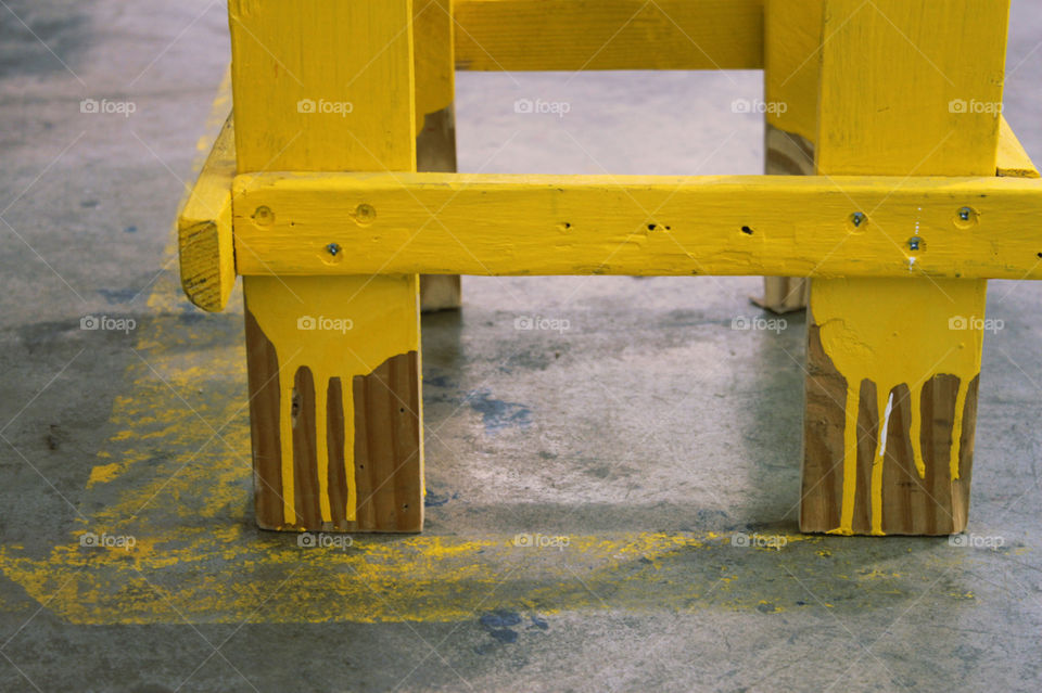 yellow chair wood floor by barkai