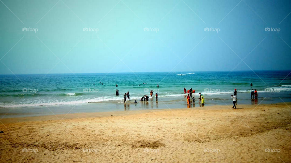 Sea beach or seashore The people are enjoying on bank.