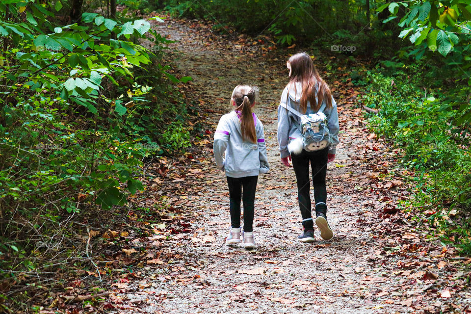 sisters on a nature trail