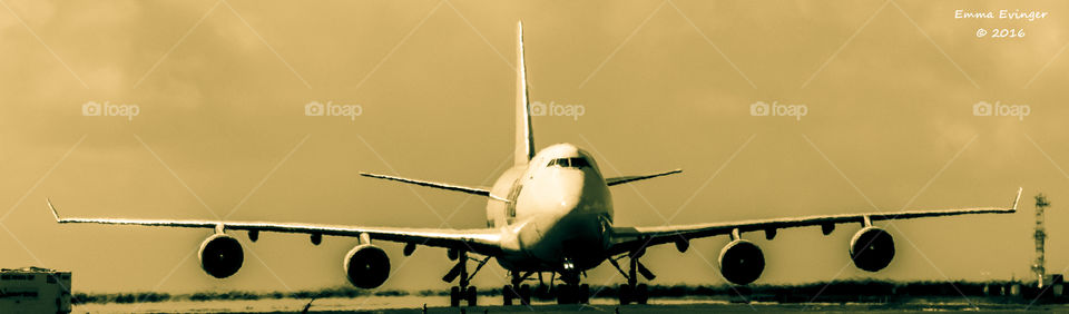 Boeing 747 preparing for takeoff on the runway. 