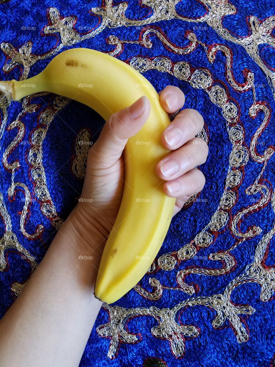 Holding banana