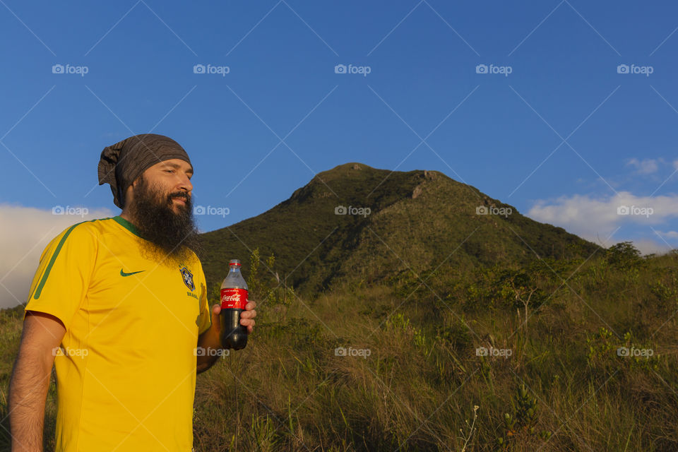 Coca Cola face to face with the mountain.