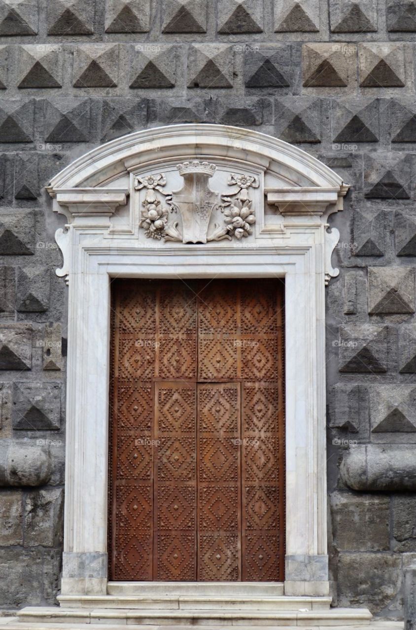 Gesu Nuovo church front door with diamonds shape black lava wall Napoli Italy