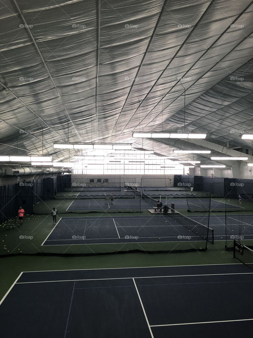 Inside sportime tennis courts on Randall’s Island nyc