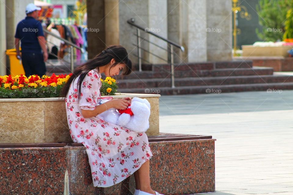 girl with white teddy bear