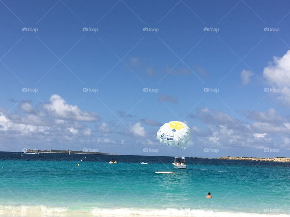Parasailing on turquoise waters