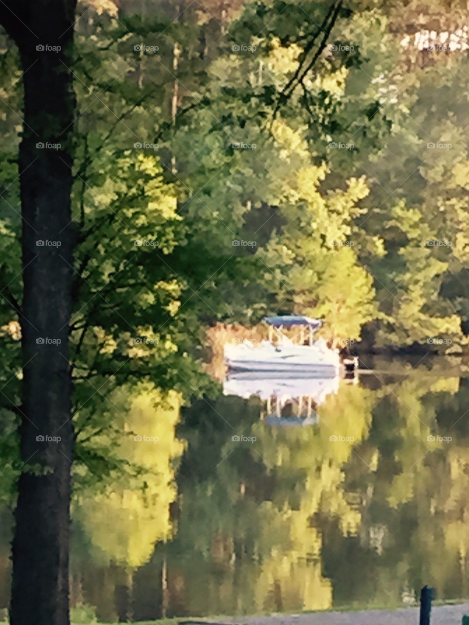 River with a leisure boat on it at Georgia National Park and campsite.