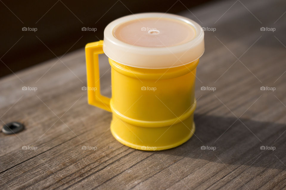 Yellow toy cup