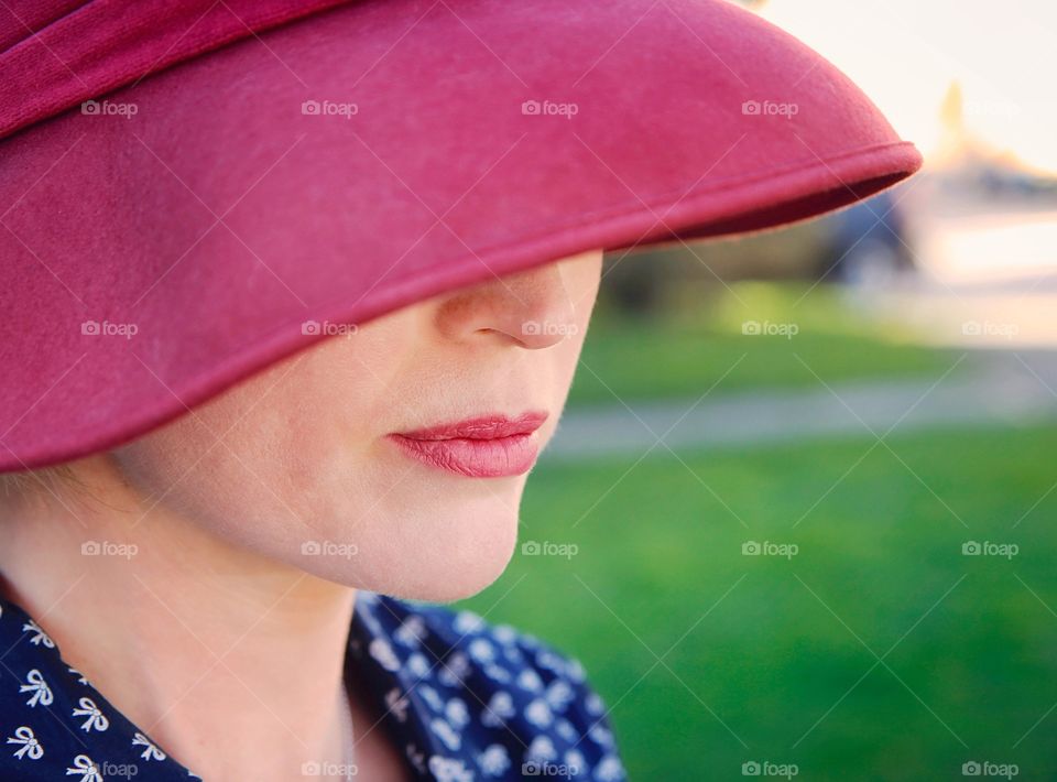 Woman in red hat