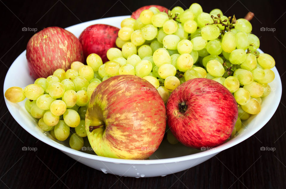 Close-up of fruits on plate