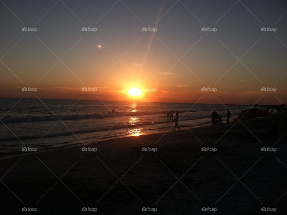 Sun setting. Sun setting over Siesta key beach, Sarasota Fl