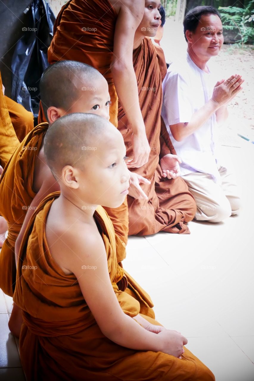 Meditation in temple 
Novice in Laos