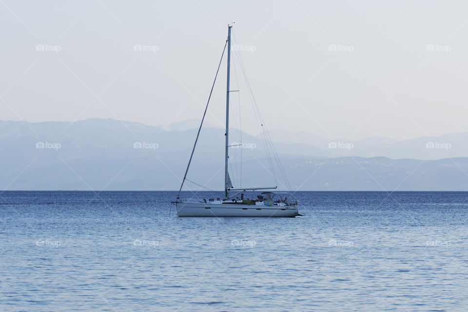 Beautiful yacht sailing at dusk in Vassiliki, Lefkada