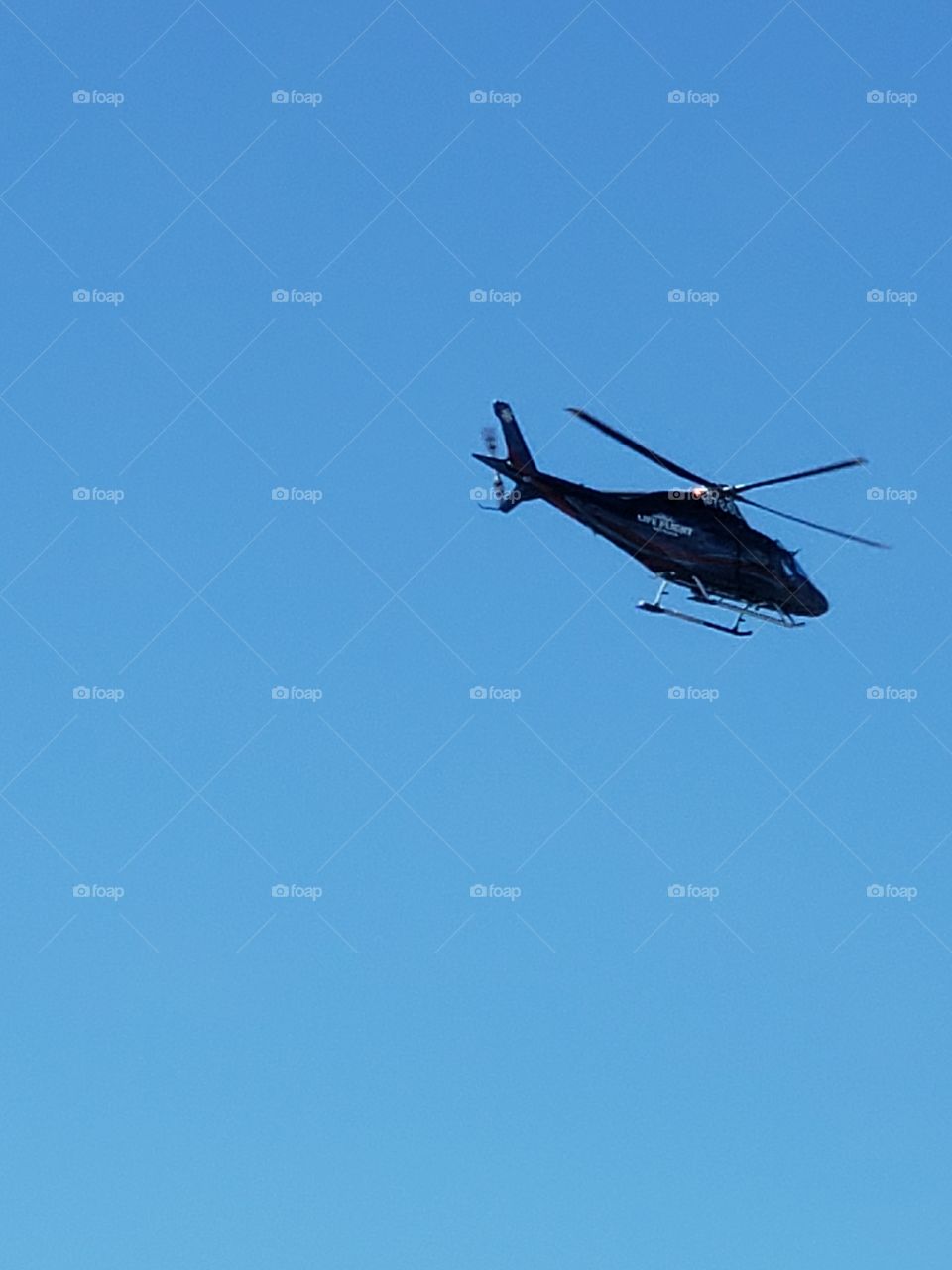 life flight helicopter taking off