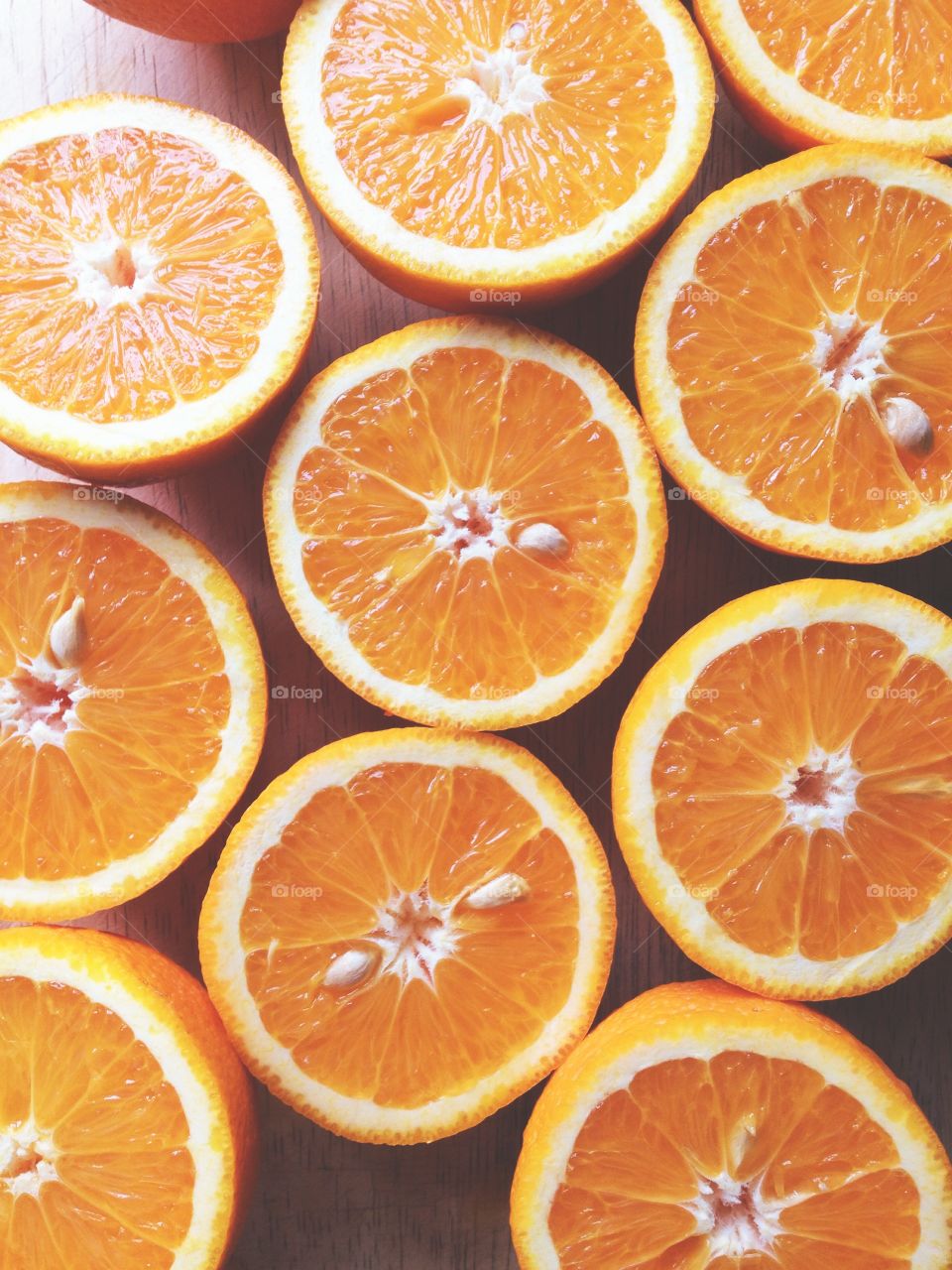 Oranges. Orange halves on a chopping board