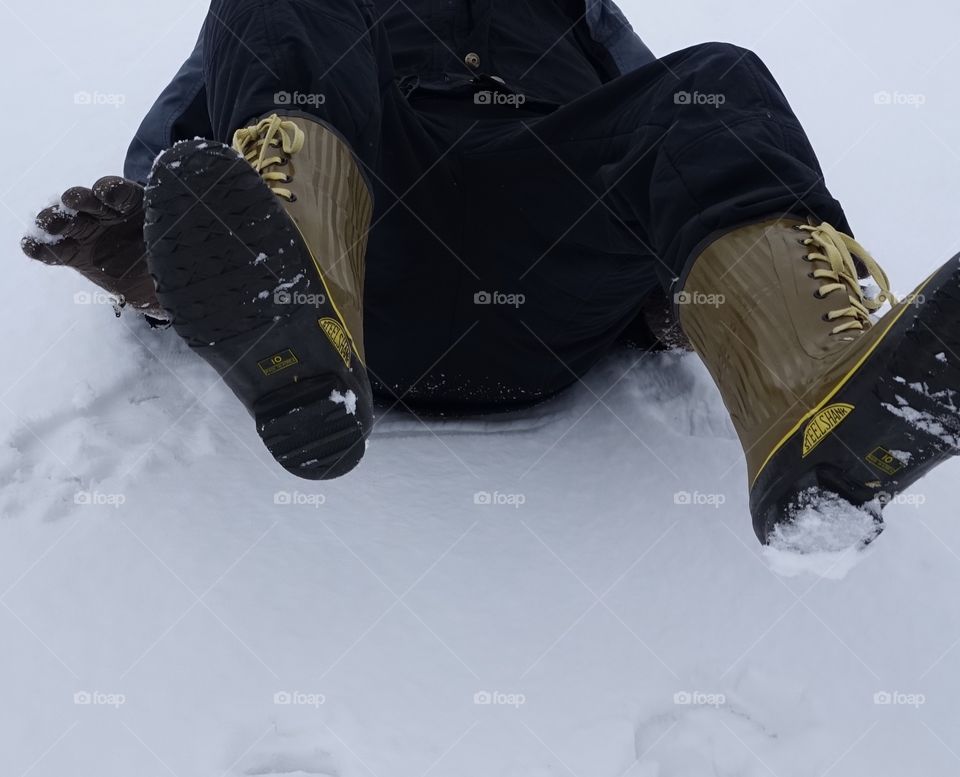 A man has fallen into the snow 
