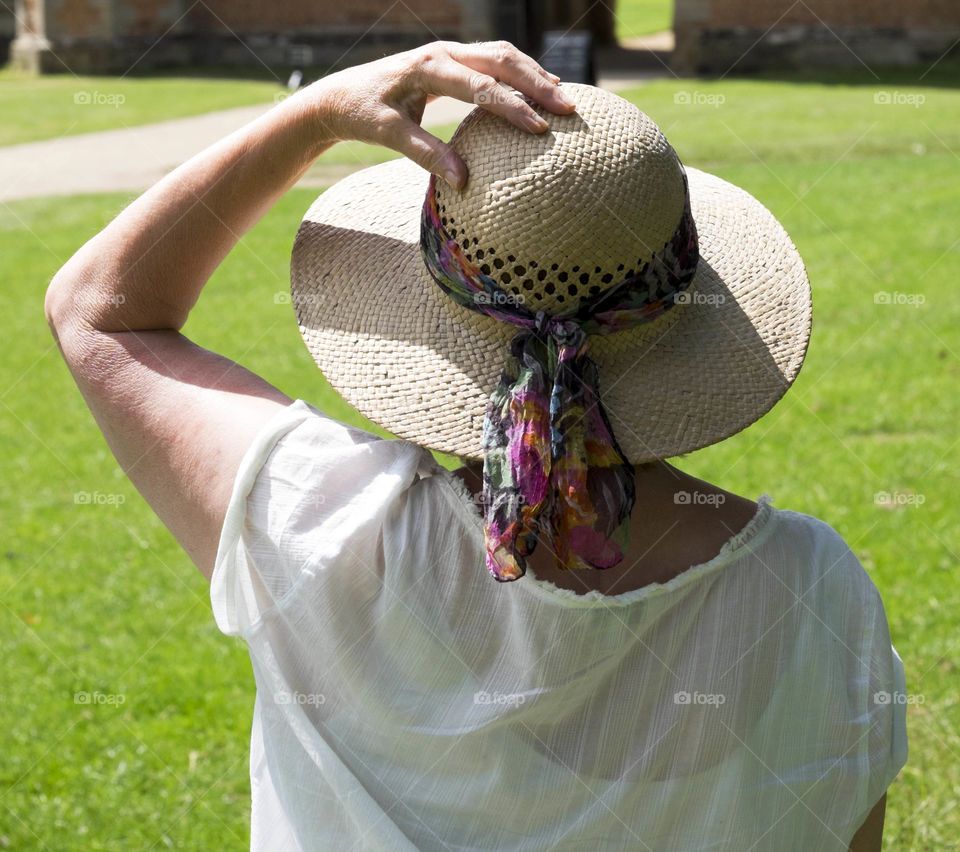 Woman. Straw hat