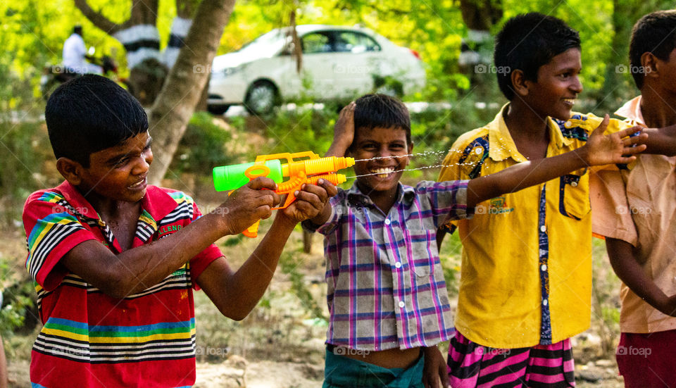 A splash story of village boys who were playing simultaneously cooling them