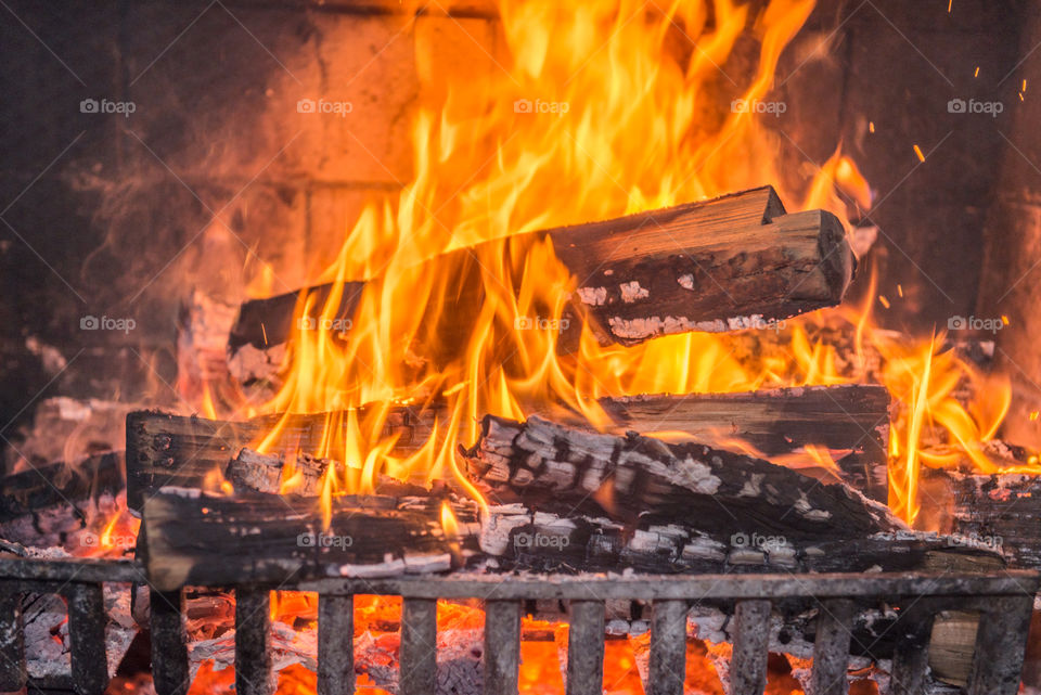 Roaring fire in the fireplace 