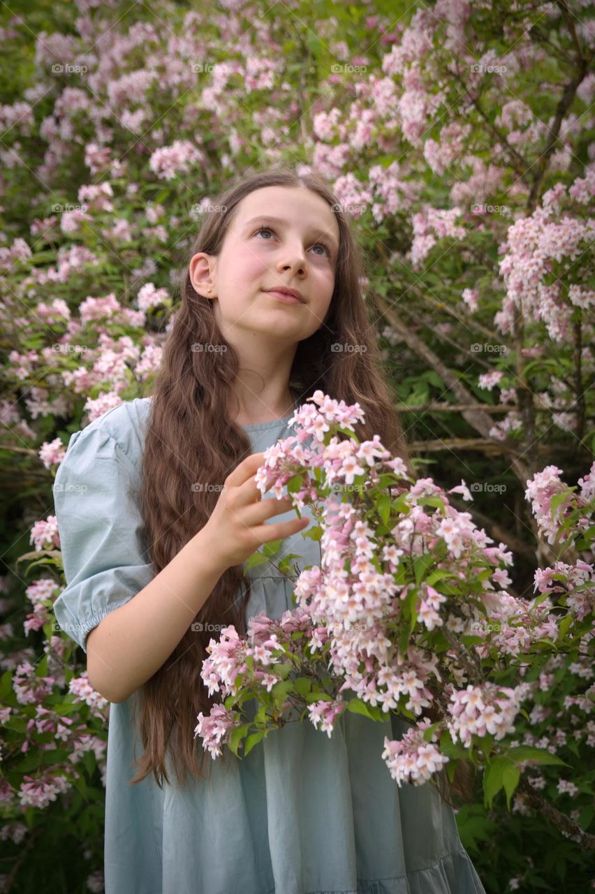 Girl with pink flowers