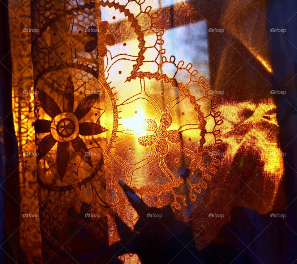 Sunset through window