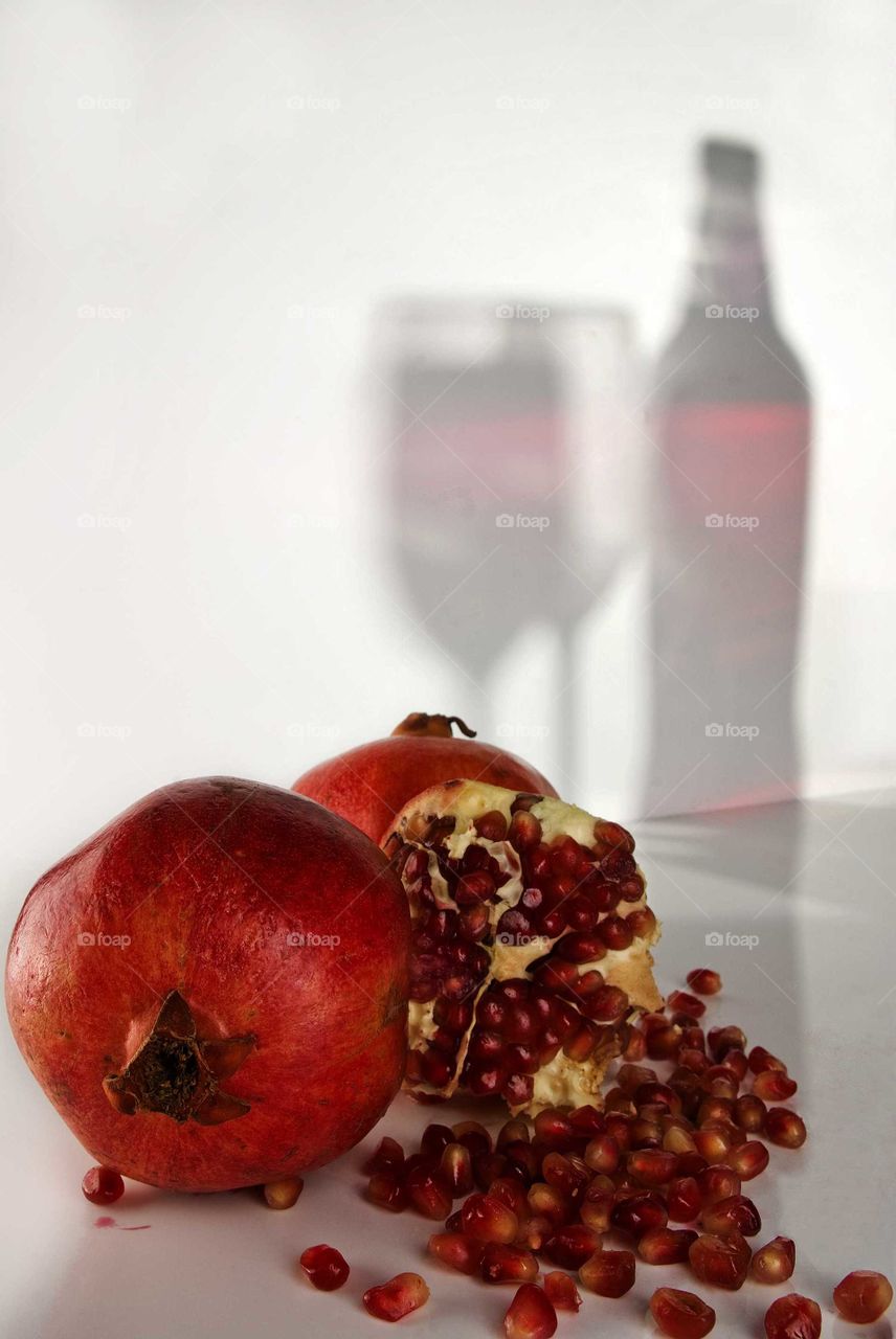 Pomegranate and winę. Red colour effect