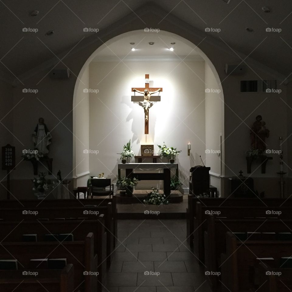 "St. Mary's Catholic Church"

In this photo, I wanted to focus on the Crucifix and how beautiful Jesus is on the cross and all his glory in the light.