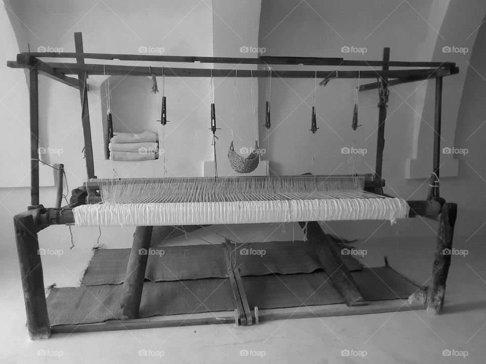 Hand weaving machine made of wood It is still used in the workshops of the island of Djerba to make the woolen covers or the silk robe, which is called the "biskari"