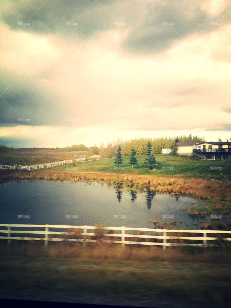 grass fence grey clouds by amyewoods28