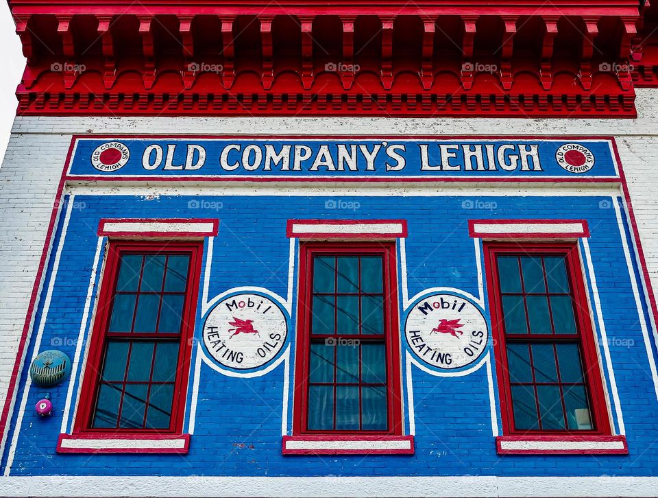 “Red, White, and lots of Blue.”  Architecture merges with color on a building in America.