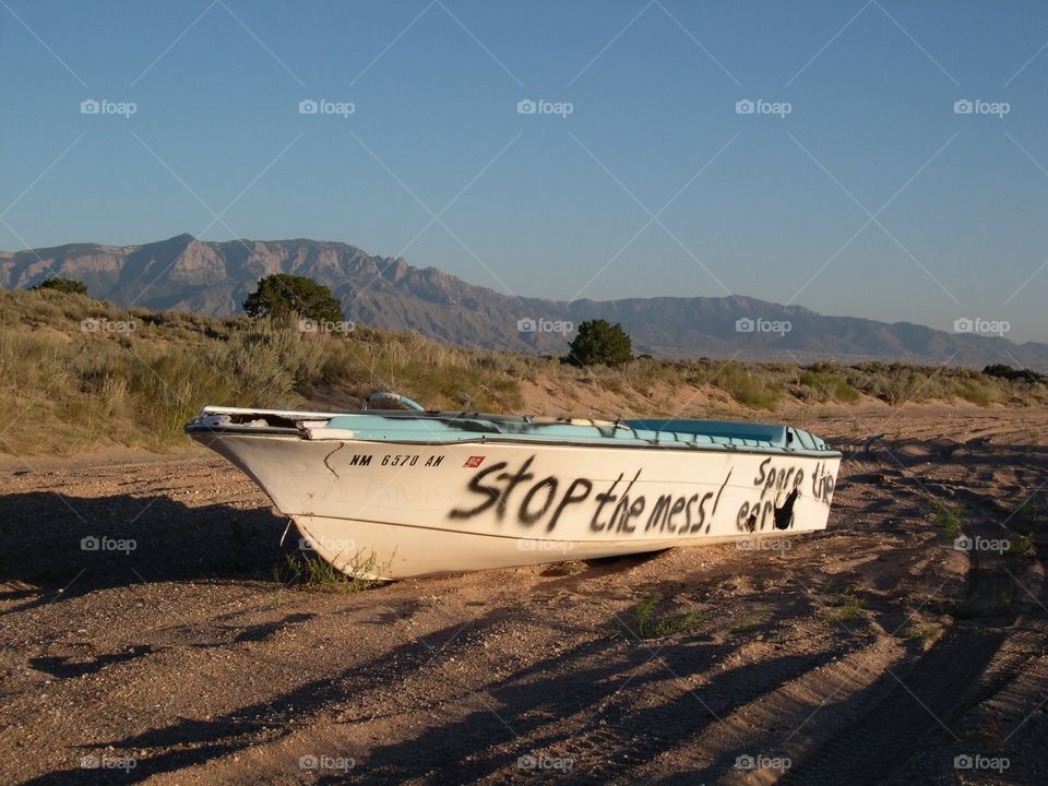 An abandoned boat in the desert. 