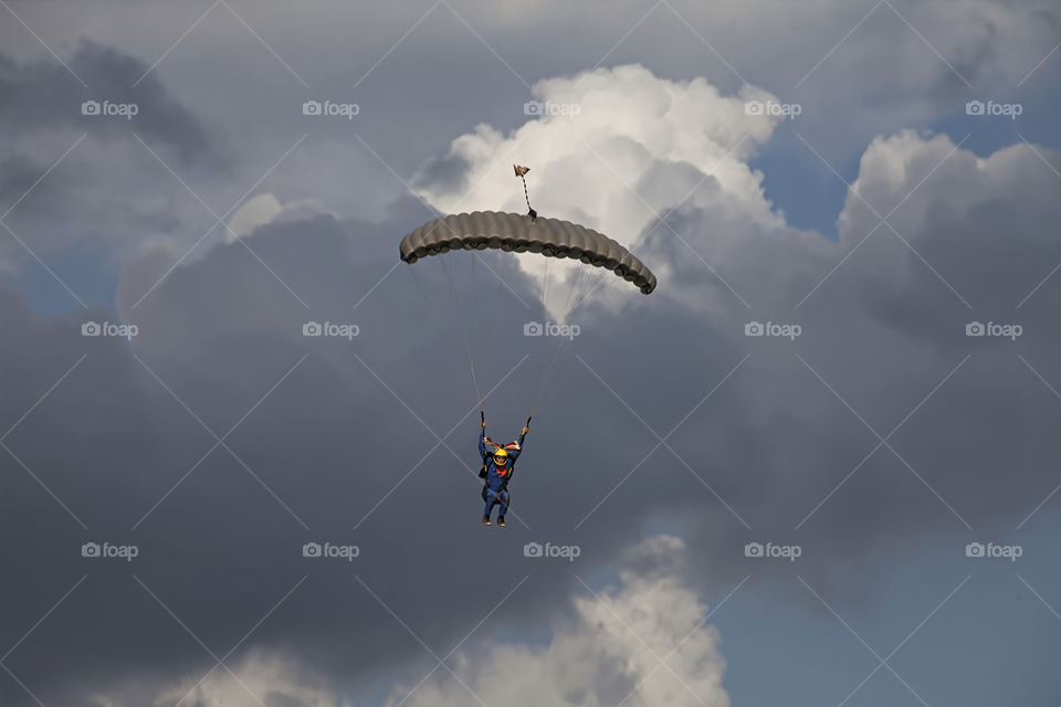 parachute and grey clouds