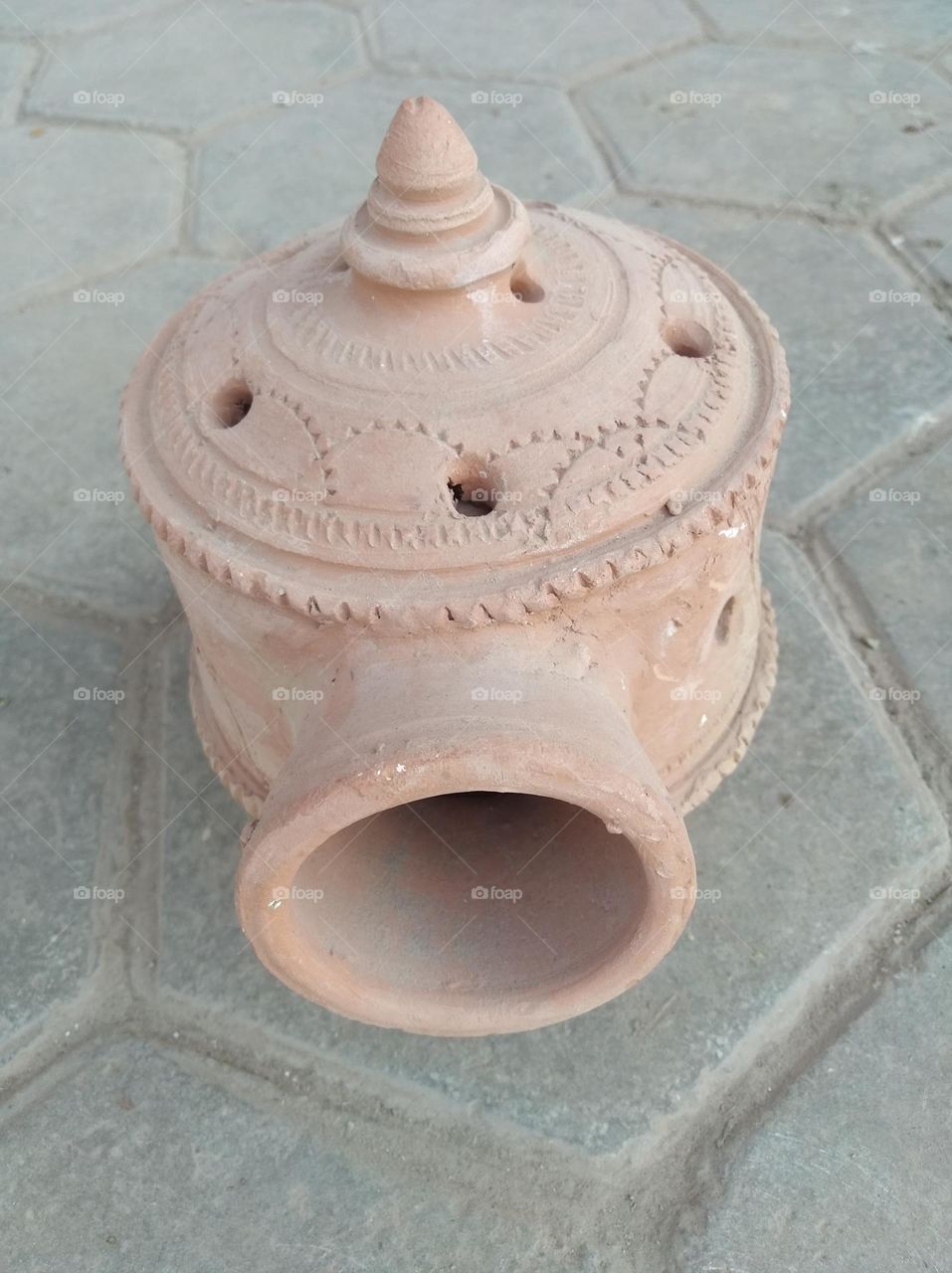 Desi lamp,a handicraft items, prepare by soil, brown in colour looks very beautiful generally use in villages
