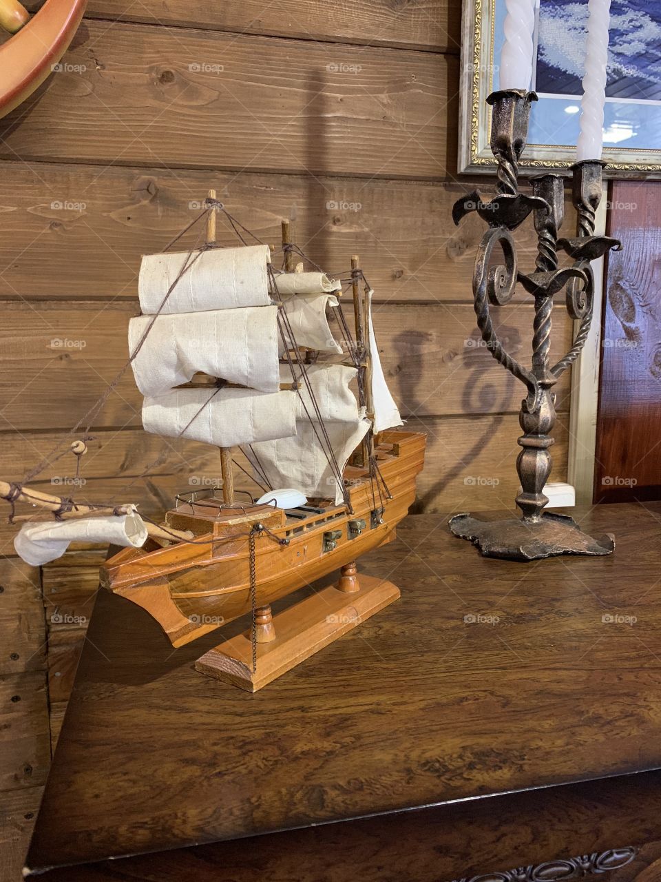 decorative figure of a ship with sails