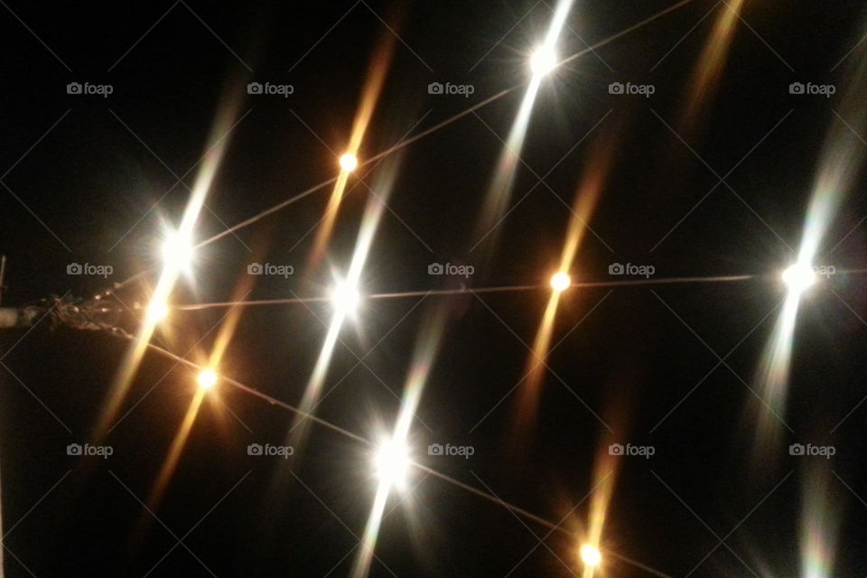 Twinkling lights. String of lights overhead at a local bar