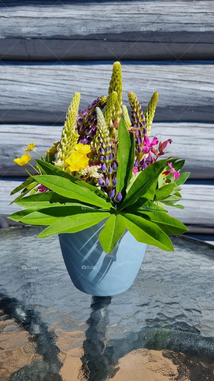 Beautiful summer flowers picked from Finnish nature in a vase.