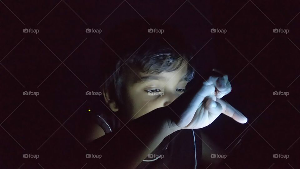 Child addicted to mobile phone