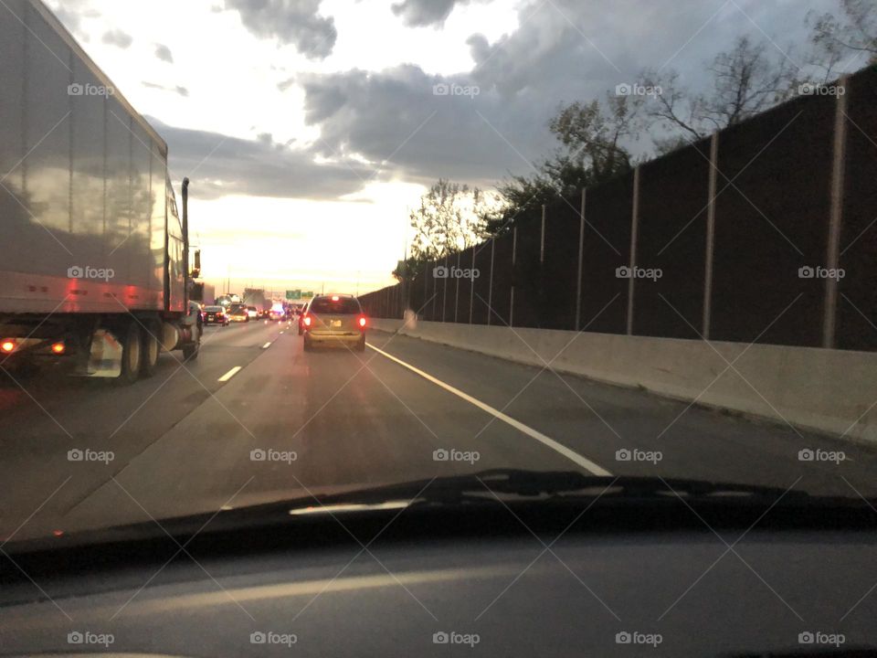 Driving home at Sunset on 80/94 expressway and sunset was so beautiful like the sun was coming out of the road. 