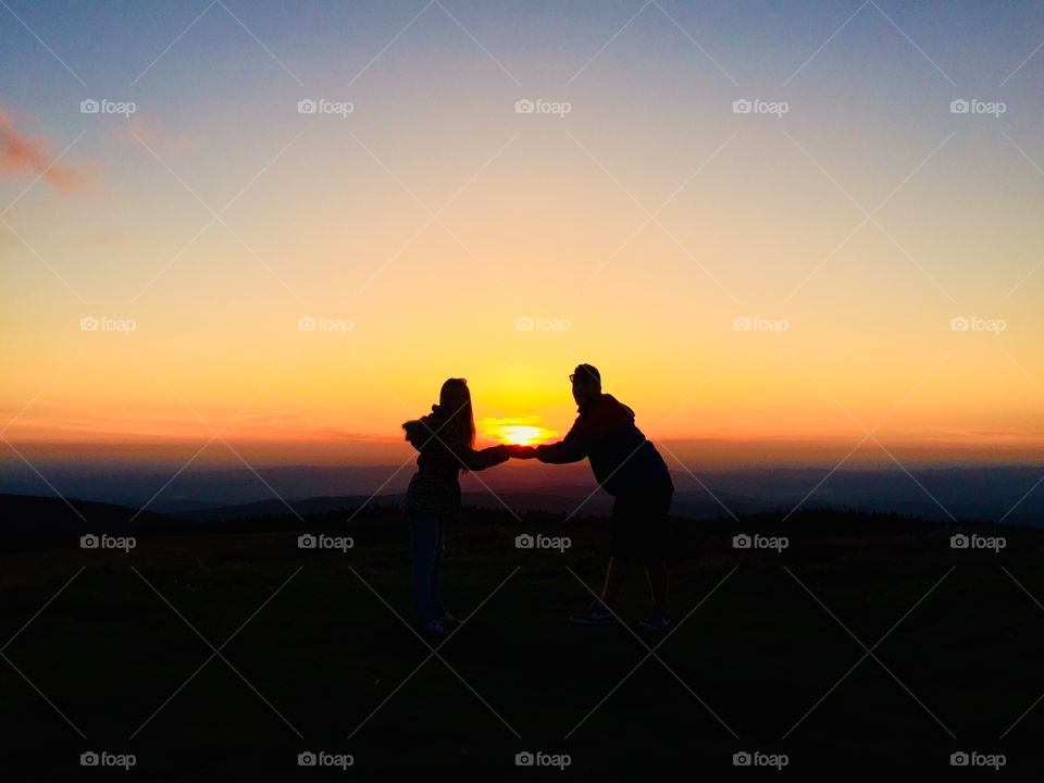 Couple holding hands