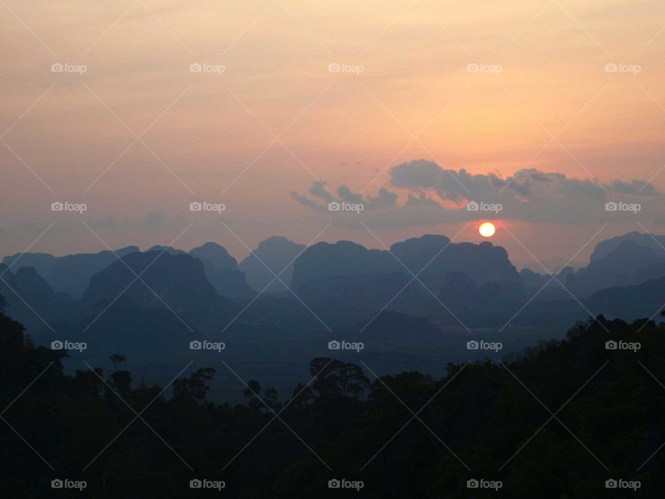 Silhouette of hills during the sunset