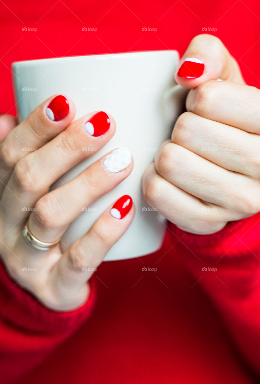 woman hand with cup of tea